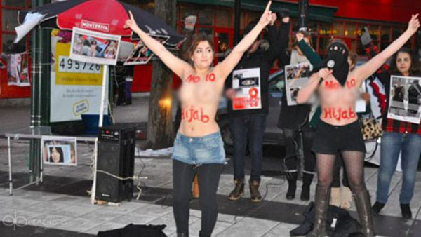 Γυμνόστηθες διαμαρτυρήθηκαν κατά της μαντίλας - Media