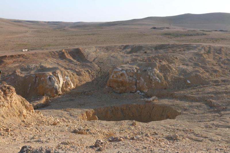 Αυτός είναι ο μεγαλύτερος ομαδικός τάφος των «εχθρών» του ISIS (Photos) - Media