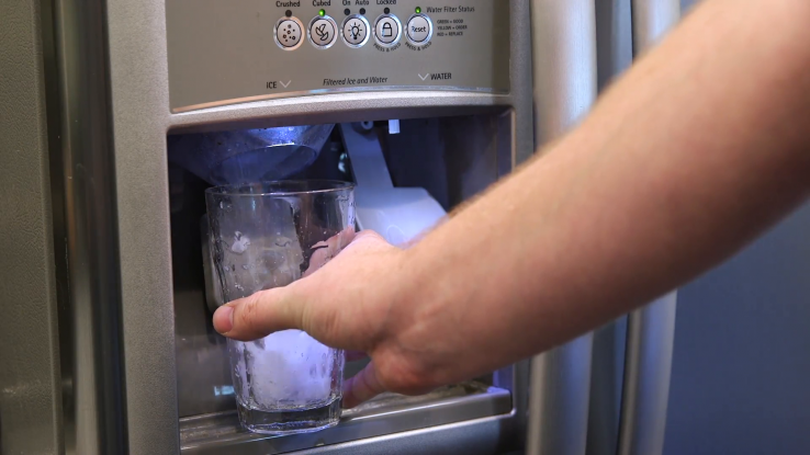 a-man-pours-ice-cubes-from-a-fridge-door-into-a-glass_vbddpt5te_f0006.png