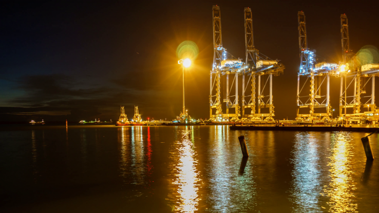 cranes-loading-and-unloading-cargo-from-ship-at-port-night-time-lapse-port-klang-malaysia_vk9qdurd_f0000.png
